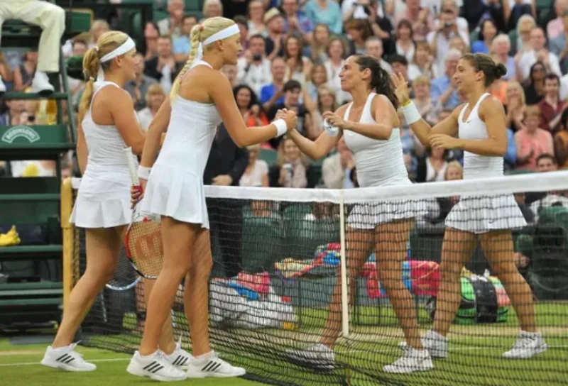 Dâu tây, kem, trang phục trắng và sân cỏ là những truyền thống đặc biệt của Wimbledon